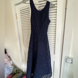 Beautiful royal blue color and flower details cris cross back tulle under skirt